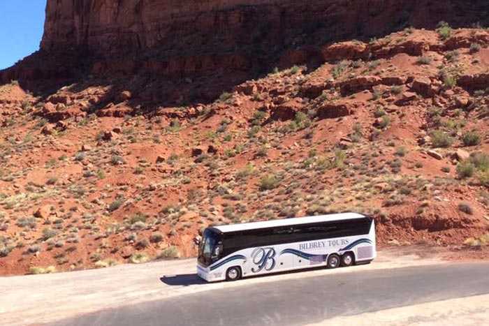 bus in a desert valley