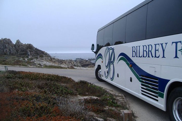 bus by rocky shore