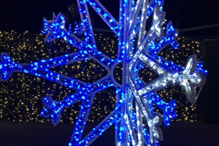 large snowflake display with blue lights