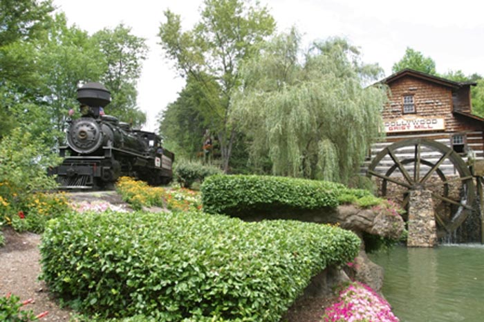 view of watermill and train